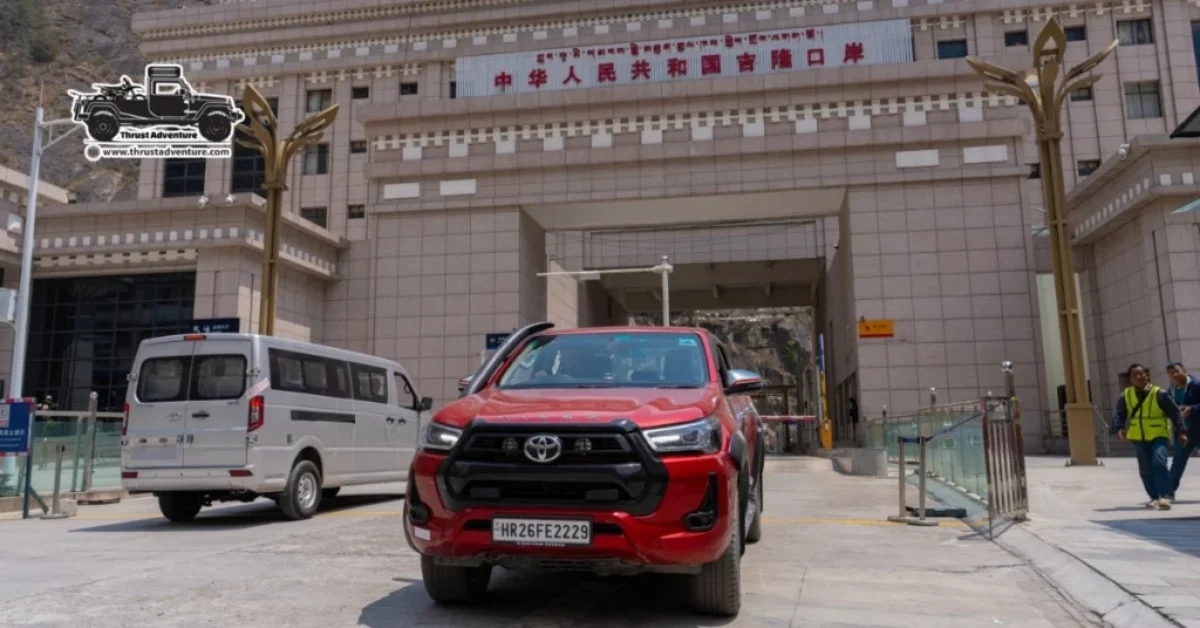 Red Car in the Tibet after crossing border of Nepal China